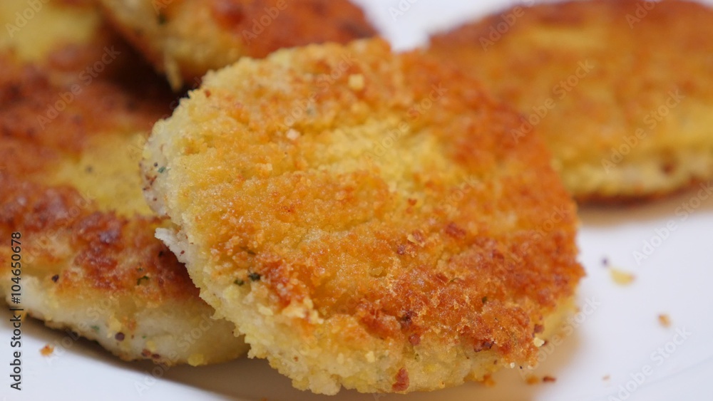 Deep fried fish finger like pieces closeup 4K 2160p 30fps UltraHD