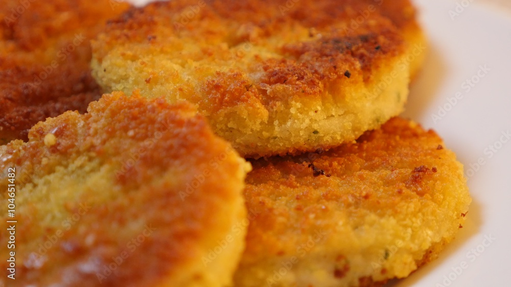 Oil deep fried fish finger like pieces close-up 4K 2160p 30fps UltraHD tilting video - Fried on oil fresh fish bars slow tilt 4K 3840X2160 UHD footage Oil deep fried fish finger like pieces close-up 4K 2160p 30fps UltraHD tilting video - Fried on oil fresh fish bars slow tilt 4K 3840X2160 UHD footage