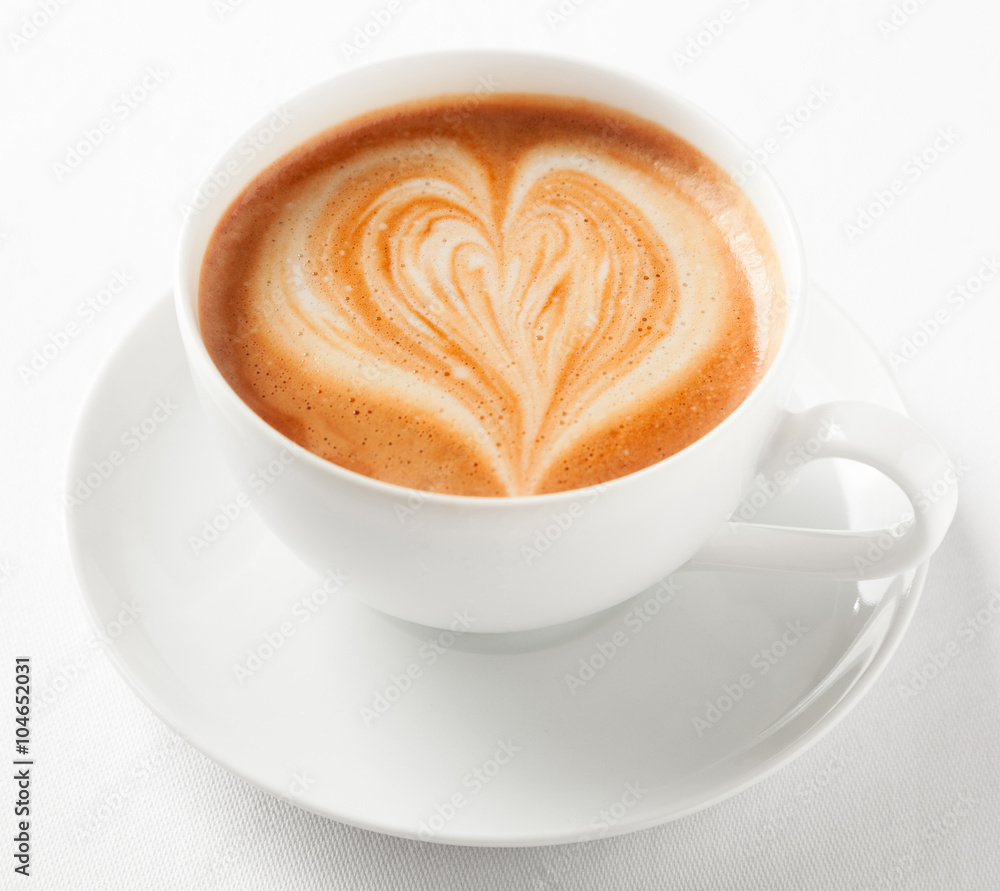 Cup of art cappuccino with a decorative heart Cup of art cappuccino with a decorative heart