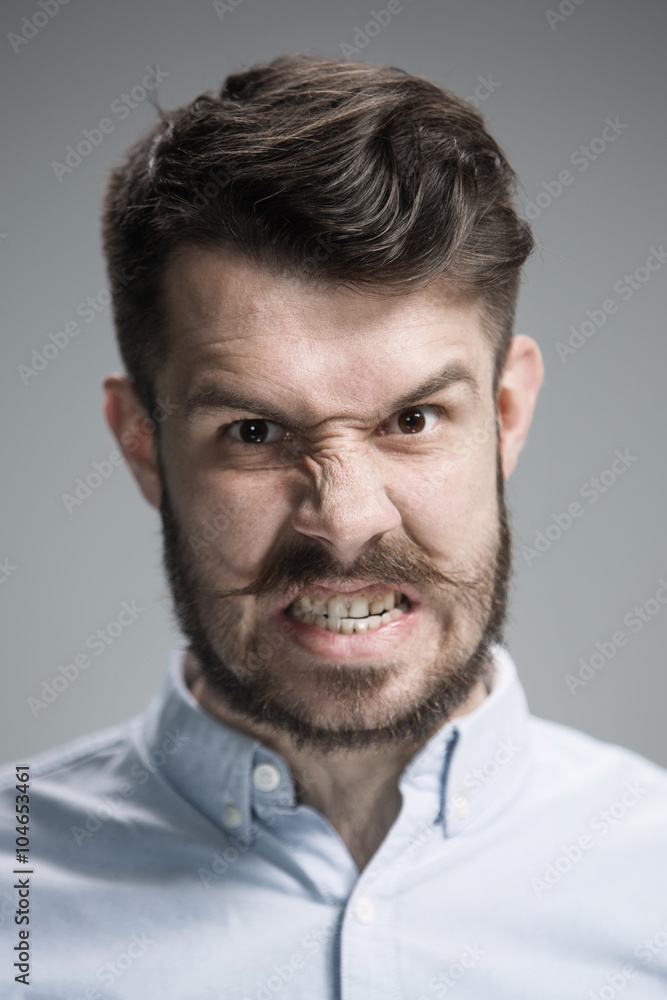 Close up face of angry man Close up face of angry man