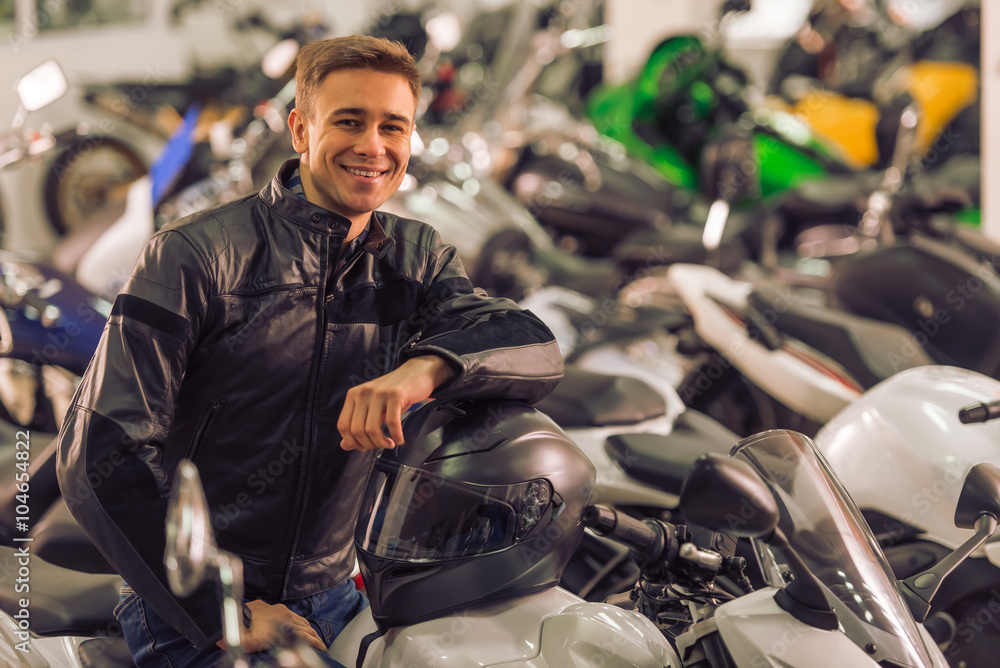 Naklejka premium Man with motorbike