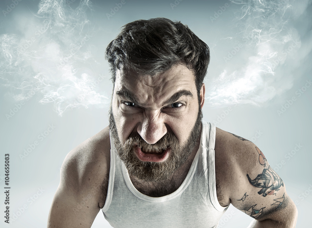 Portrait of a really mad man StockFoto Adobe Stock