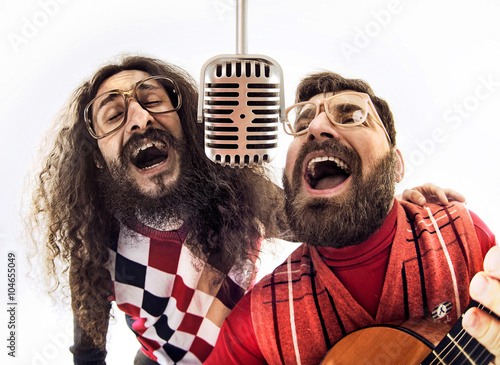 Two nerdy guys singing together