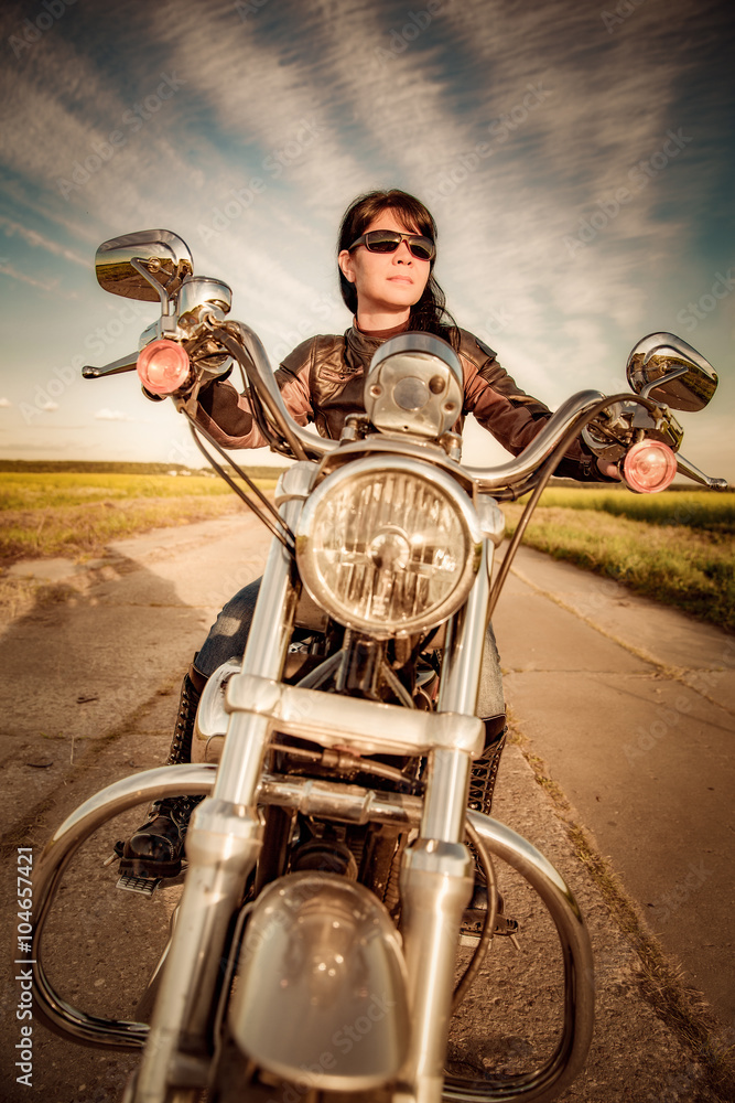 Biker girl on a motorcycle