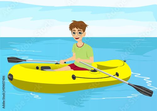 teenager boy with glasses in yellow rubber boat