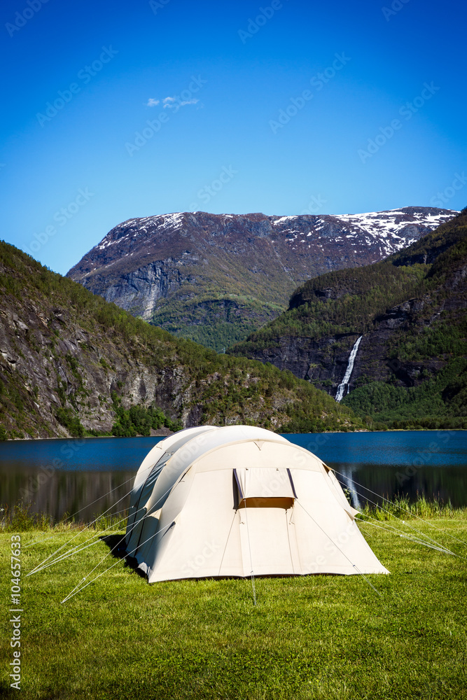 Tourist tent on the shore of the lake. Tourist tent on the shore of the lake.