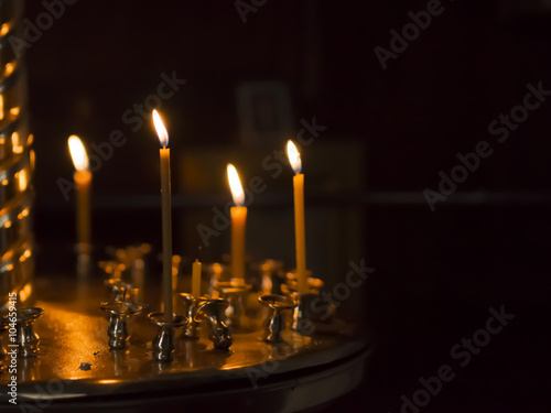 The burning candles on a candlestick