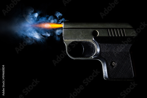Pistol firing bullet. Illustration on black background