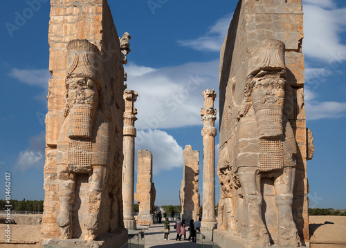 People Passing the All Nations Gate in Persepolis of Iran photo