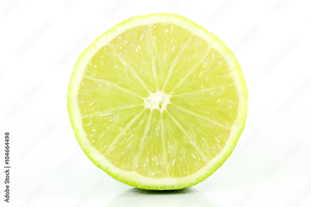 fresh lemon lime citrus fruit slice closeup in white background
