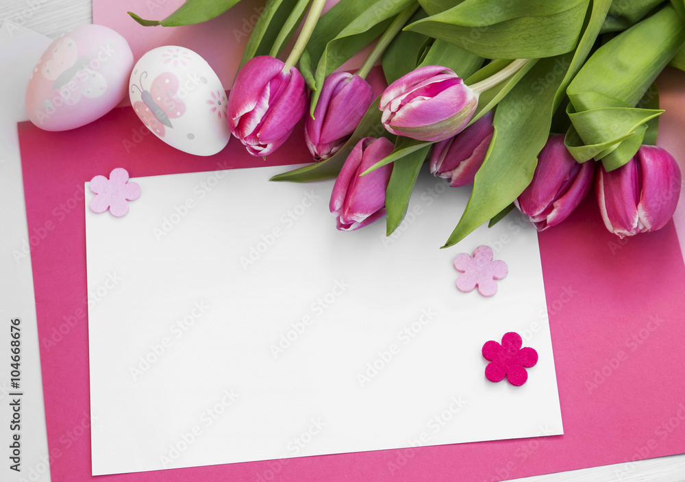 Easter holiday greeting with tulips and easter eggs decorations