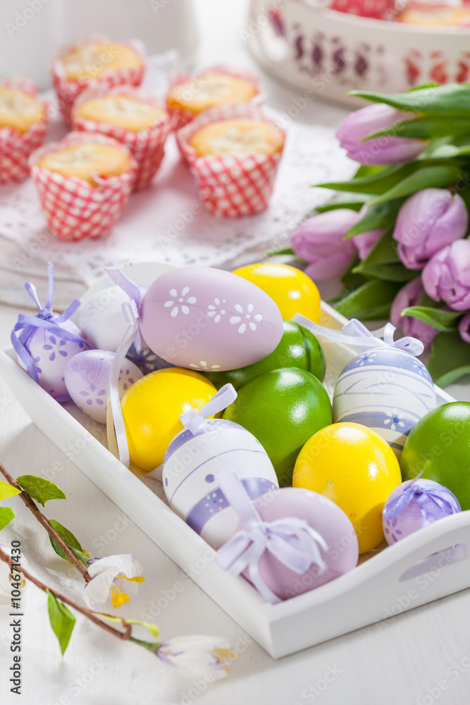 Easter place setting with painted eggs Easter place setting with painted eggs