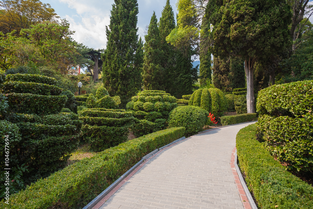 Fototapeta premium Beautiful garden with hedges. Pushkin Park, Gruzuf Crimea, Ukraine
