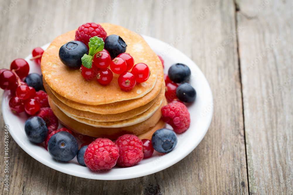 Stack of pancakes with blueberry and fresh berry. Stack of pancakes with blueberry and fresh berry.