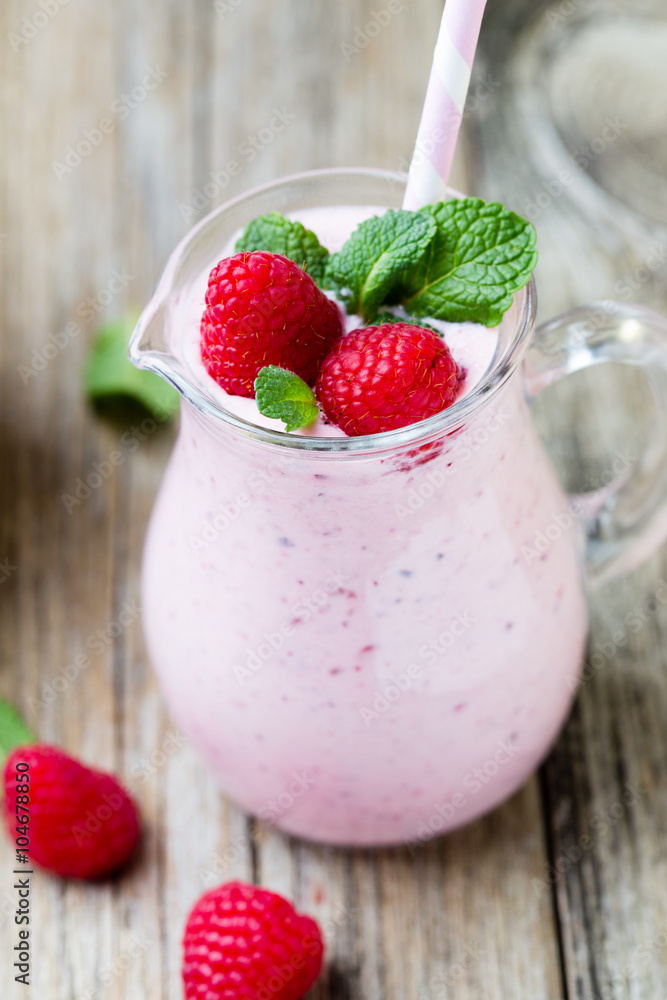Raspberry milk shake with mint decor. Raspberry milk shake with mint decor.
