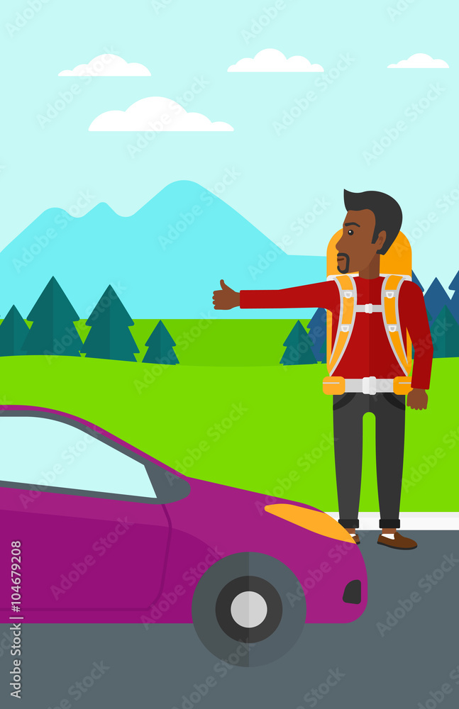 Young man hitchhiking.