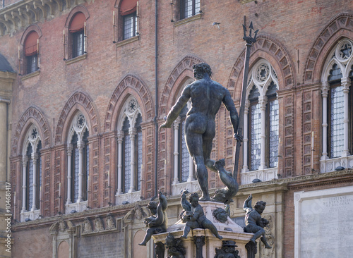 behind the monument of Neptune in Bologna in Italy