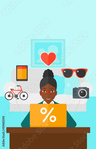 Woman shopping online using her laptop.