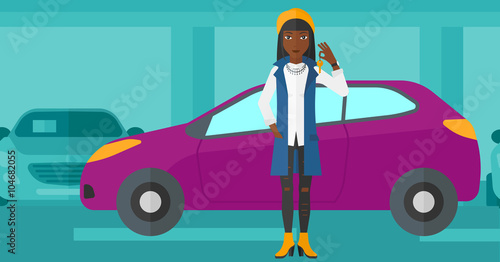 Woman holding keys from new car.