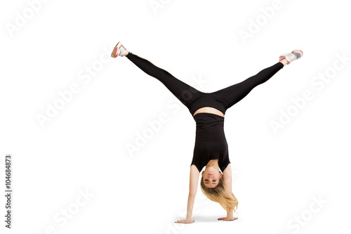 Caucasian woman doing cartwheel isolated on white  photo