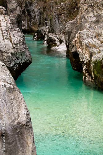 portrait of picturesque great canyon gorge of emerald-green Soca river in Triglav national park, Slovenia