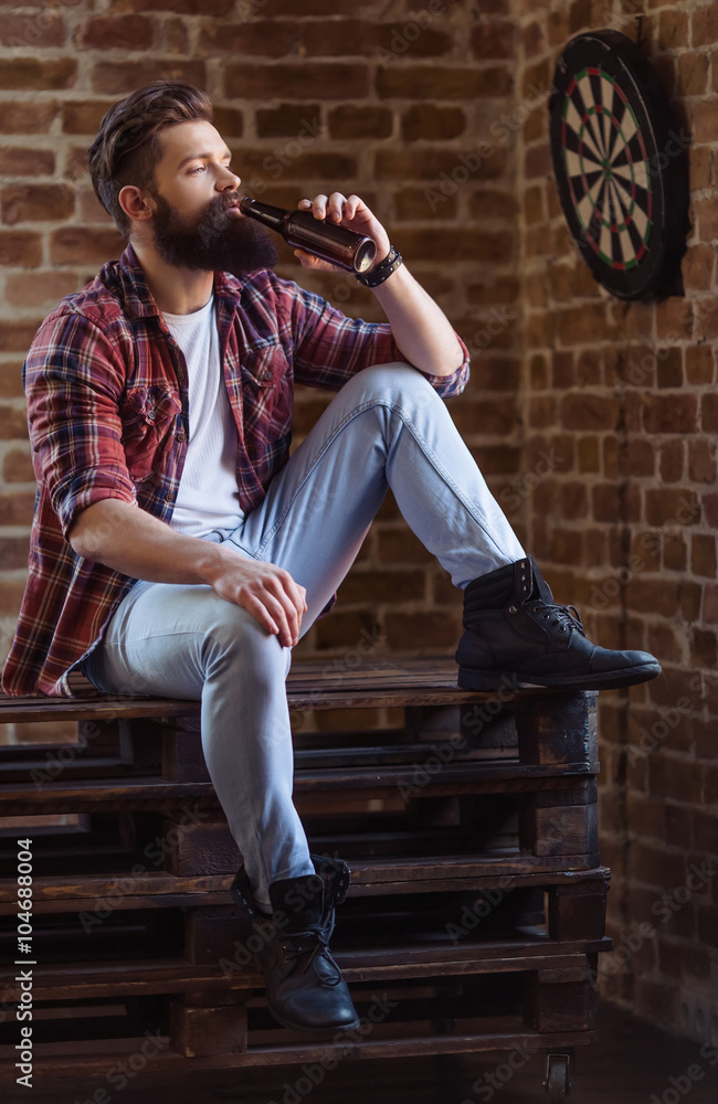 Stylish young bearded man