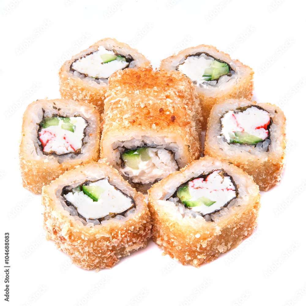 Deep fried japanese tempura roll with snow crab, cucumber, sesame, unagi sauce, cream cheese and crispy breading - isolated in white background Deep fried japanese tempura roll with snow crab, cucumber, sesame, unagi sauce, cream cheese and crispy breading - isolated in white background