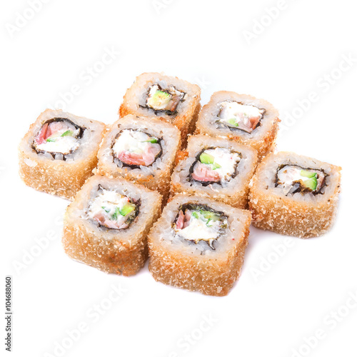 Deep fried japanese tempura roll with tiger prawns, bacon, cream cheese and crispy breading - isolated in white background