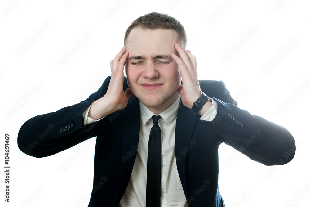 Frustrated business man with a headache isolated over white Frustrated business man with a headache isolated over white