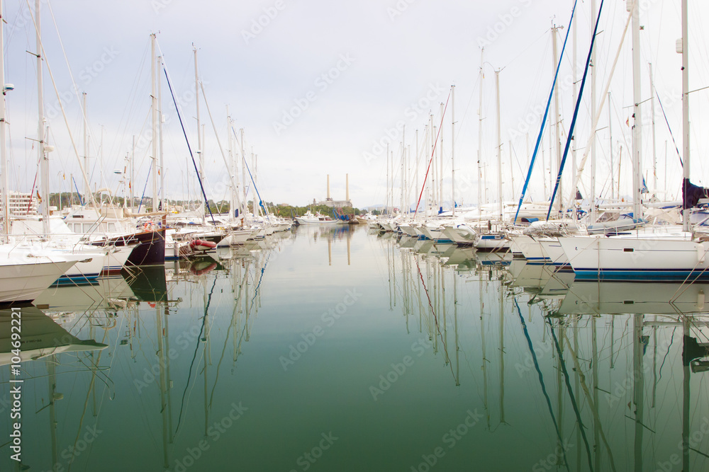 White boats and yachts in the quay