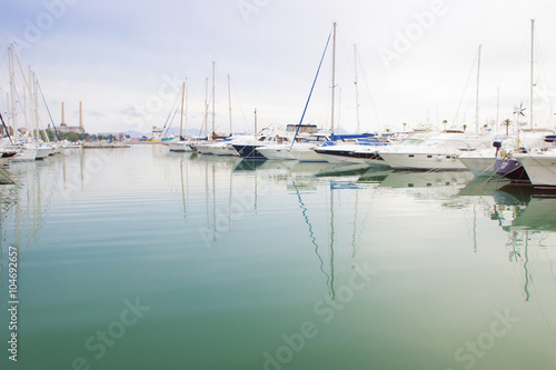 White boats and yachts in the quay © agephotography