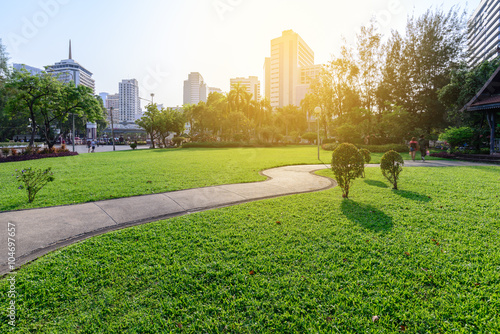 Fototapeta Naklejka Na Ścianę i Meble -  Beautiful urban park in sunny day of Bangkok city, Thailand.