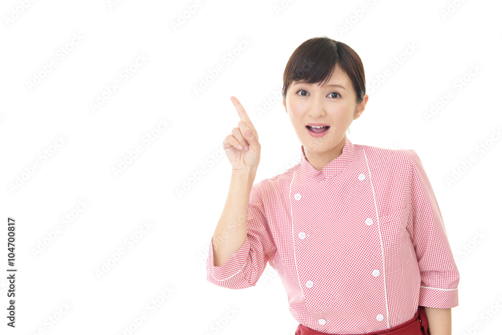指示する笑顔のウェイトレス 指示する笑顔のウェイトレス