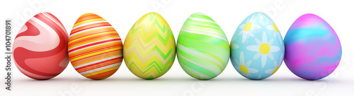 Line of colorful Easter eggs isolated on white