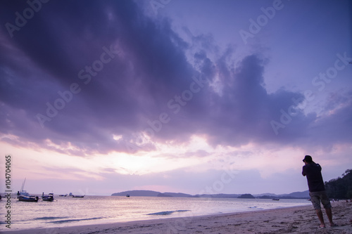 photographer shooting sunset at thailand