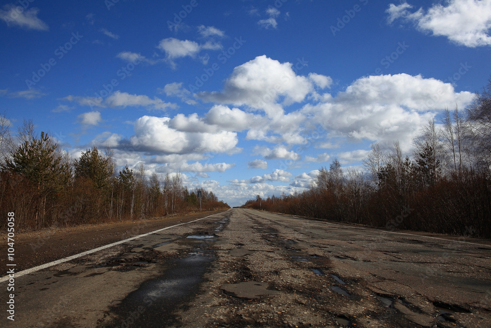 Autumn road and sky with clouds Autumn road and sky with clouds