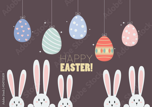 Colorful hanging easter eggs with bunnies