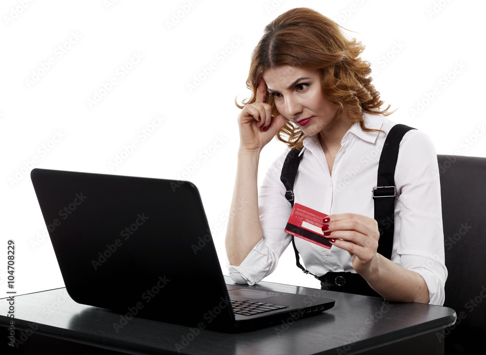 Suspicious businesswoman with credit card Suspicious businesswoman with credit card