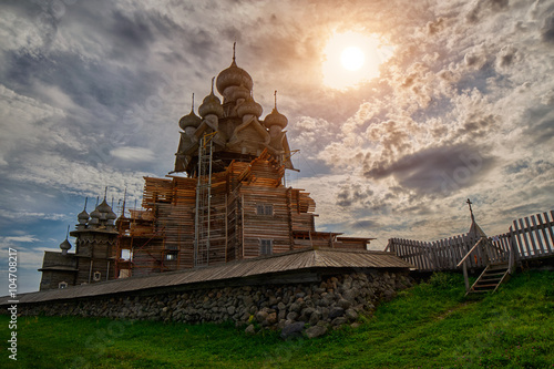 Sunset over wooden Church