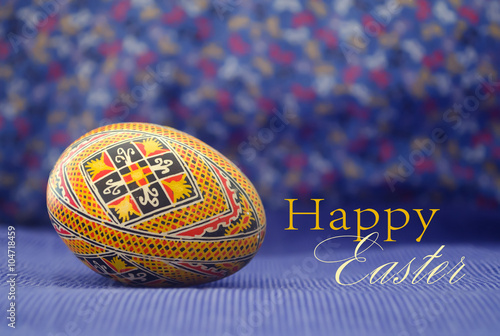 Easter egg painted in beautiful ethnic pattern. Old, traditional handcraft design.