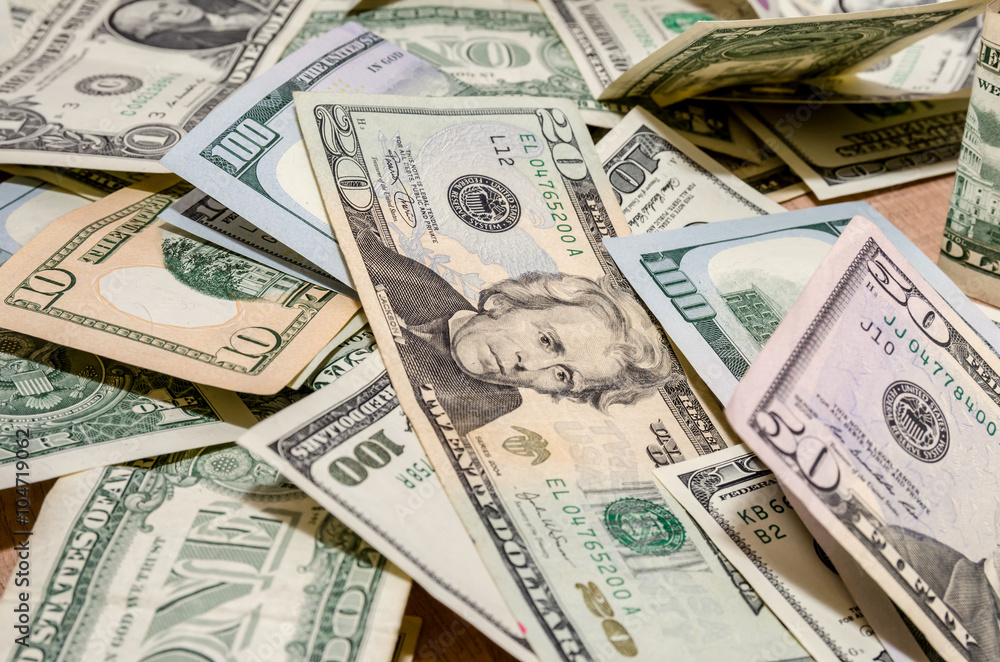 different US Dollar and Euro bills on table different US Dollar and Euro bills on table