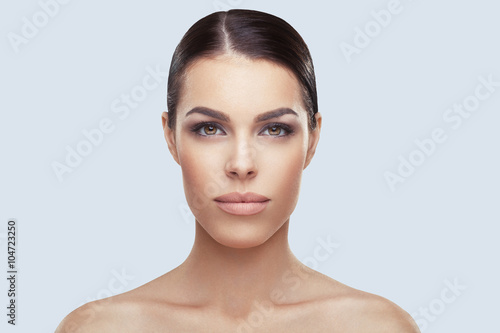 Beautiful face of young woman with clean skin © djile