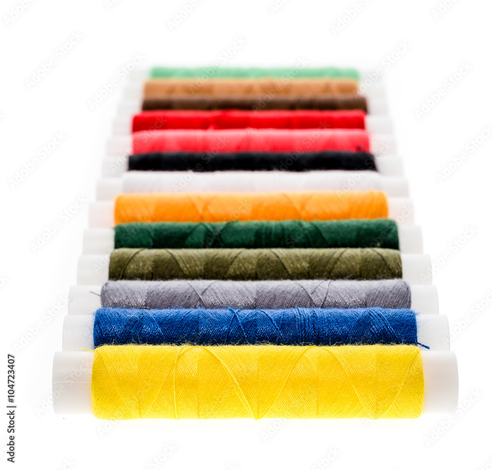 Different color Sewing Threads on a roll. Different color Sewing Threads on a roll.