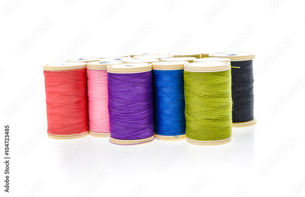 Different color Sewing Threads on a roll. Different color Sewing Threads on a roll.