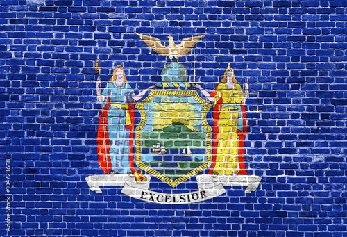New York US flag painted on old vintage brick wall