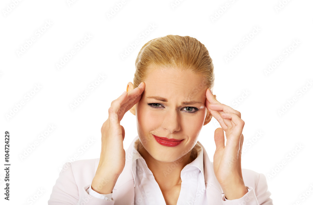 Business woman wtih huge head ache Business woman wtih huge head ache