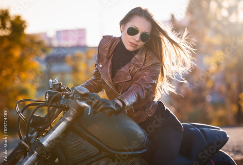Schilderij op canvas Tanya. motorcycle, brown jacket, half height!