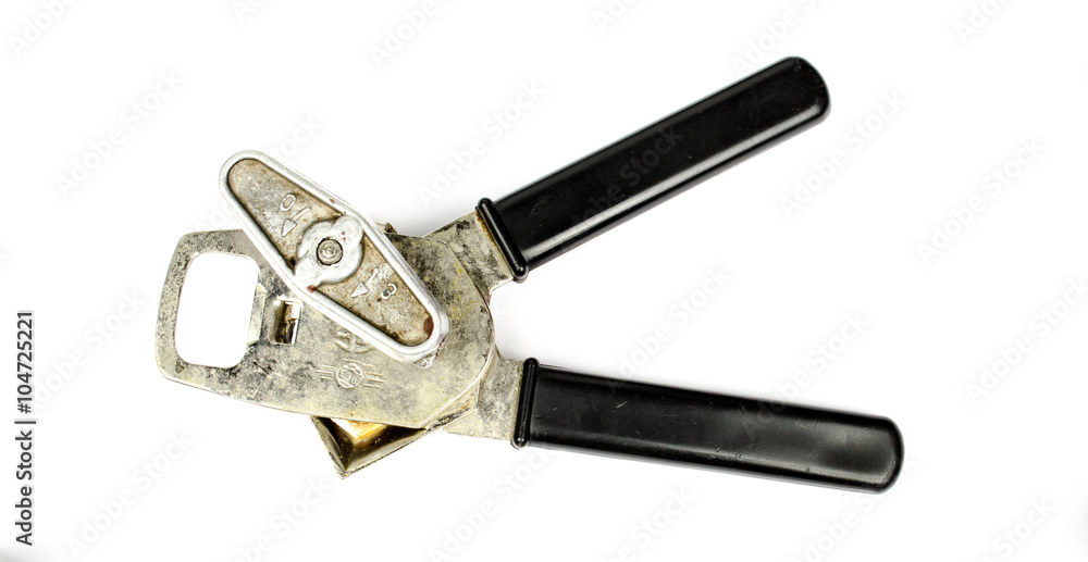 Can opener with cap lifter isolated on white background. Stainless steel can opener isolated on white background. A can opener on white background. Can opener isolated on white background