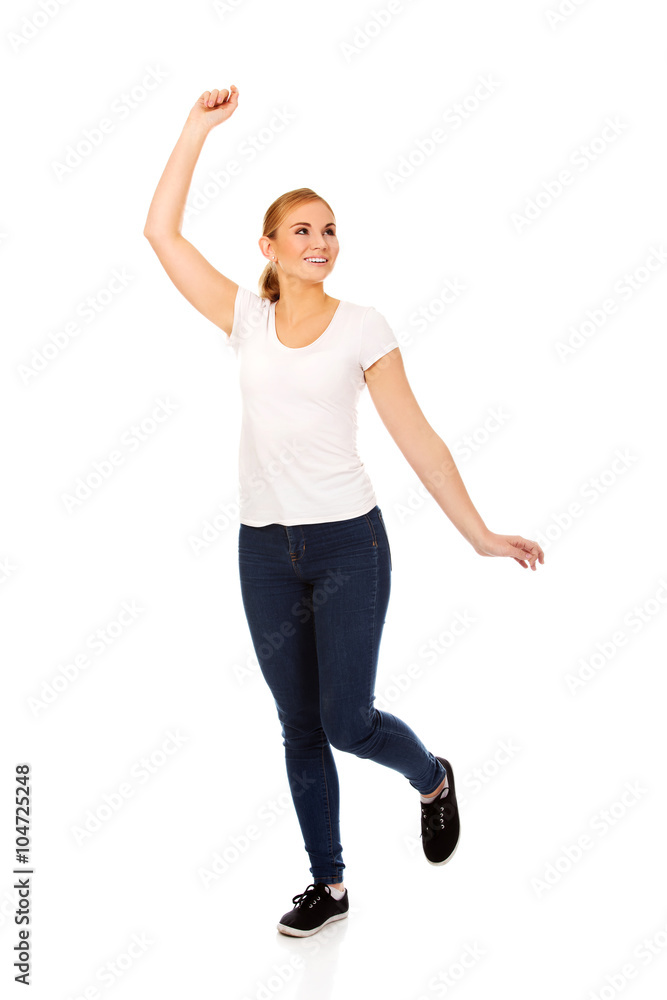 Young woman with hand up