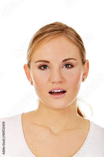 Young shocked woman with open mouth